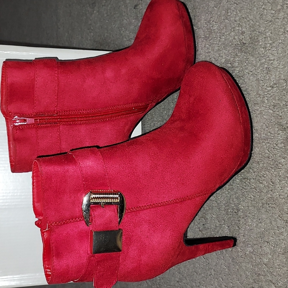 Red booties with gold accents